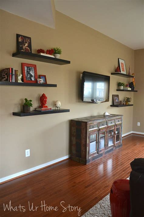 An electric fireplace in the center of one of the walls that is roughly 4 1/2' and i am at a loss for decorating on either side of it and possibly. How to Decorate Around a TV with Floating Shelves | Whats ...