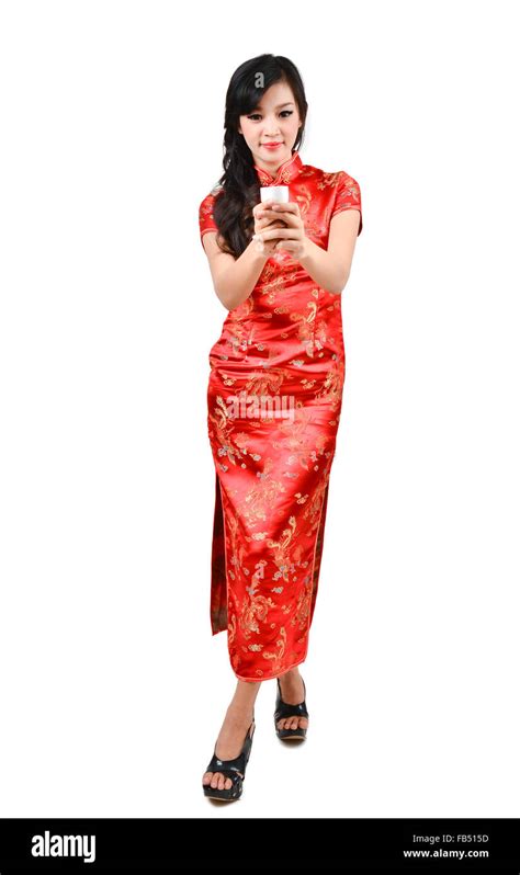 Pretty Women With Chinese Traditional Dress Cheongsam And Drinking Tea