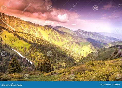 Awesome Bright Sunset In The Mountains Landscape In Bright Col Stock