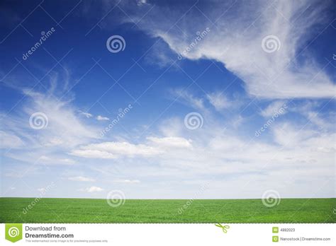 Green Field Blue Skies White Clouds In Spring Stock Image Image Of