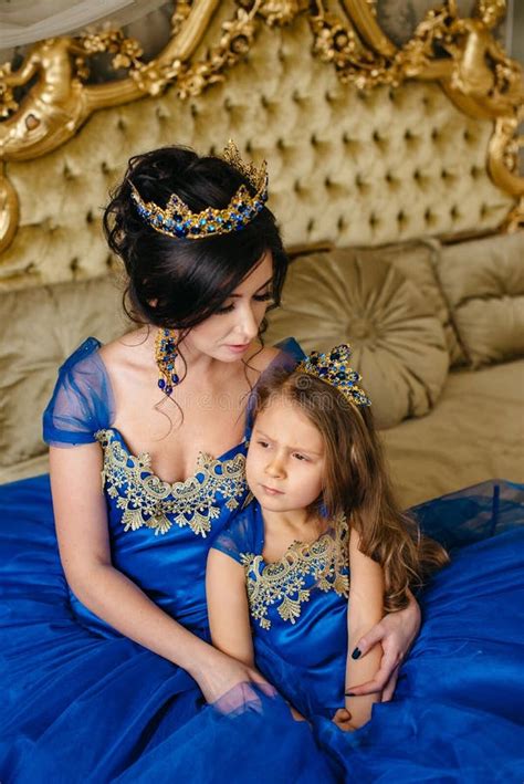 Beautiful Princess Mother And Daughter In A Gold Crown Stock Image