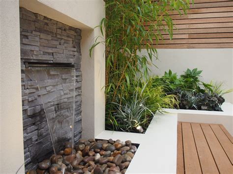 Water Feature Wall Provides Privacy In Small Terrace Garden In Fulham