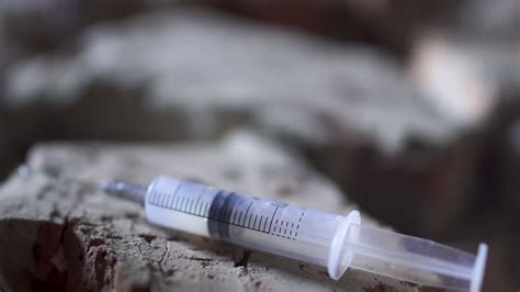 Drug Addict Takes A Syringe With An Injection Stock Video Footage 0013