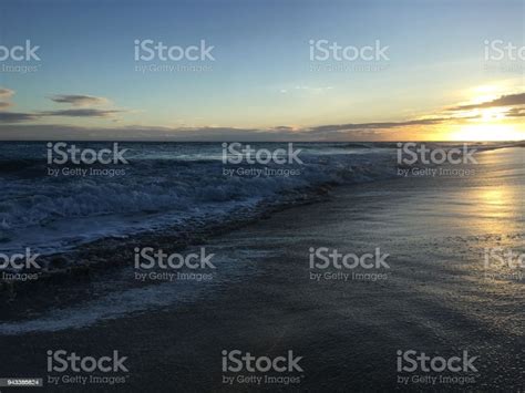 Pacific Ocean Waves At Beach In Kekaha During Sunset On Kauai Island In