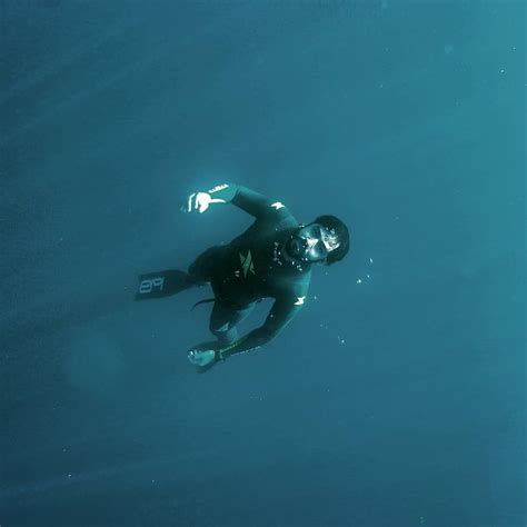 Underwater Men Barefaced Freediver In Wetsuit