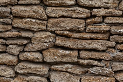Backdrop Of Dry Stone Wall With Uneven Surface · Free Stock Photo