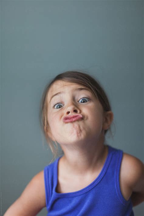 Simple Indoor Portrait Of Young Girl Making A Silly Face By Stocksy Contributor Amanda