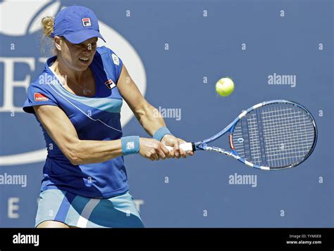 Kim Clijsters Of Belgium Hits A Backhand To Ana Ivanovic Of Serbia On