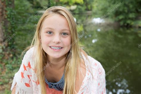 Portrait Of Pretty Teen Girl With Dental Braces Stock Photo By