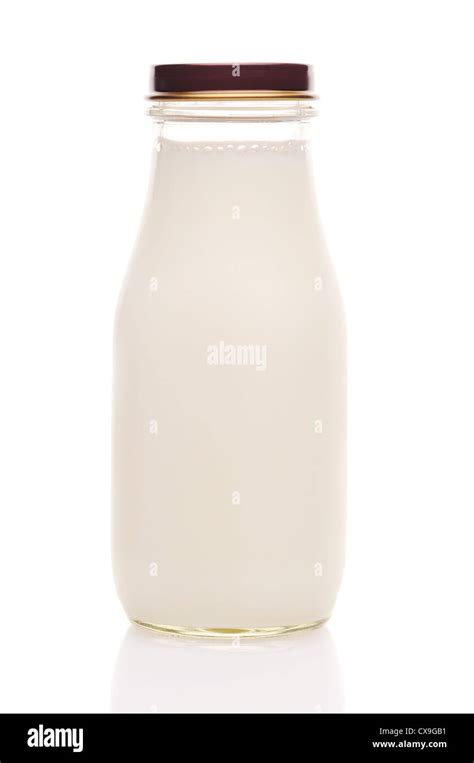 Old Fashioned Glass Milk Bottle Isolated On White With Reflection Stock