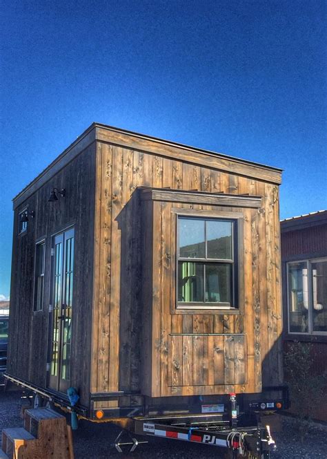 A Tiny House With A Wood Exterior And 178 Sq Ft Of Space Currently Available For Sale In