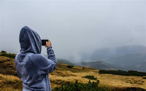 Person Taking Photo Of Mountain · Free Stock Photo