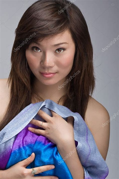 Sexy Asian Beauty Teasing Stock Photo By Stockhouse