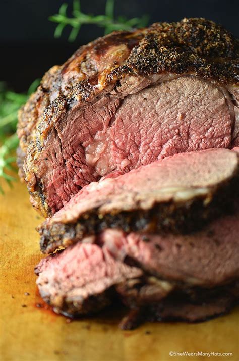 The premium cut of beef, prime rib, is seasoned with simple herbs, then smoked and roasted to perfection on the traeger. slow roasted prime rib recipe alton brown