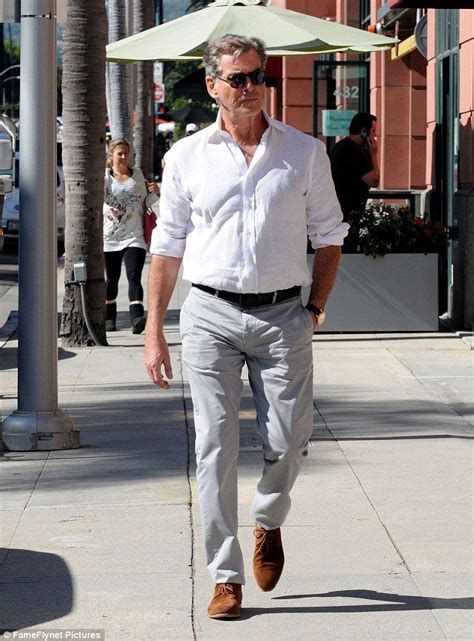 dapper dude pierce brosnan 63 looked as though he hadn t aged a day since his 007 heyda