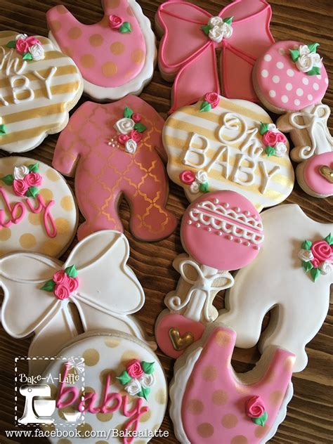 Here are some baby shower cookies for girls. Baby shower decorated cookies in pink and gold by Bake-a ...