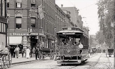 A Trolley On Merrimck Street Passing Centeal Street In Downtown Lowell