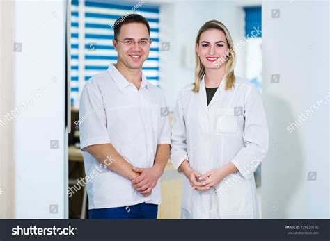 Two Male Female Doctors Nurses Standing Stock Photo 725622196
