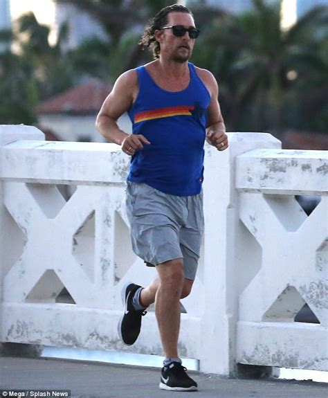 Matthew Mcconaughey Shows Off Muscular Arms While Jogging Daily Mail
