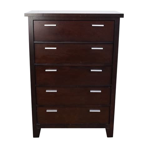 This dresser features seven spacious drawers with three felt lined top drawers and four cedar lined bottom drawers. 60% OFF - Ashley Furniture Ashley Furniture Dark Wood 5 ...