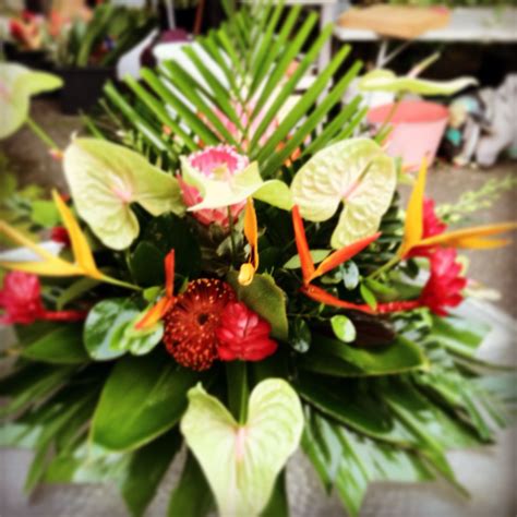 Spray Arrangement With Heliconia Red Torch Ginger Green Anthuriums Ti Leaf And Palm Leaves