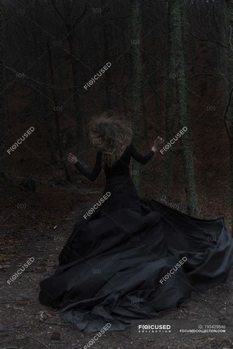 Woman Wearing Long Black Dress Running Dark Forest — Paranoia Horror