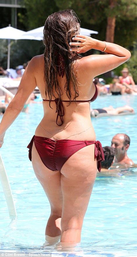 Imogen Thomas Flaunts Ample Bust And Posterior In Skimpy Burgundy