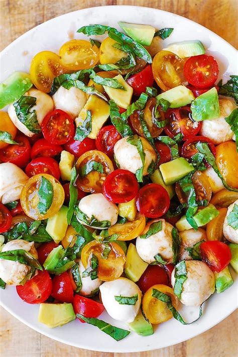 With its colorful jumble of tomatoes, avocado, olives, mozzarella and cucumber, this has everything you've ever wanted in a pasta salad. Tomato Basil Avocado Mozzarella Salad with Balsamic ...