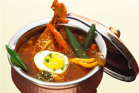Soup curry (スープカレー) is a dish to eat rice into soup using various spices with vegetables and meats. SOUP CURRY SET | BOMBAY BLUE ボンベイブルー