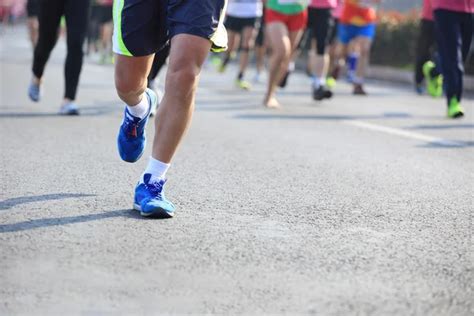 Marathon Athletes Running On Road Stock Photo By ©lzf 95808914