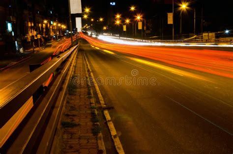 Long Exposure Of Traffic Lights And Lamp Posts Light In The City Line