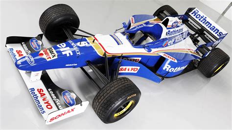 Jacques Villeneuves Schumacher Conquering Williams F1 Car Up For