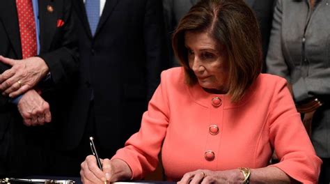 Pelosi Hands Out Souvenir Pens Dems Slammed For Gloating As House Delivers Trump Impeachment