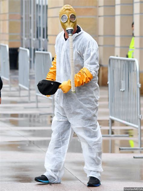 Howie Mandel Wears Hazmat Suit And Gas Mask After Poking Fun At Coronavirus Victim