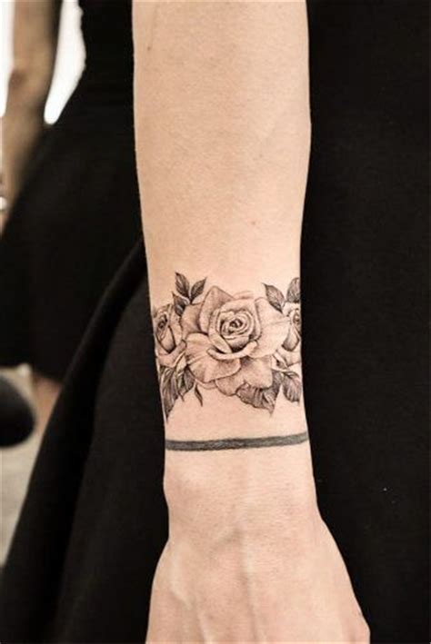 Many men decide to cover their wrist in a tattoo that wraps itself entirely around the arm. 50 Meaningful Wrist Bracelet Floral Tattoo Designs You ...