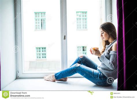 Resting And Thinking Woman Calm Girl With Cup Of Tea Or Coffee Sitting