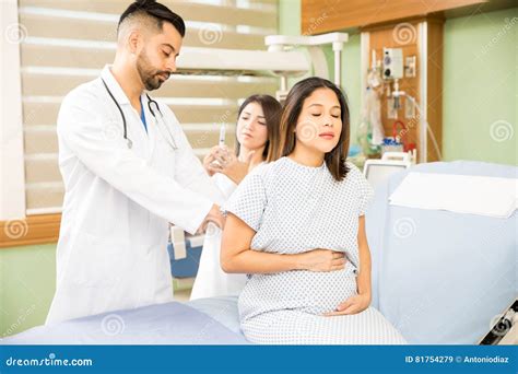 Pregnant Woman Getting A Shot Stock Image Image Of Nurse Labor 81754279