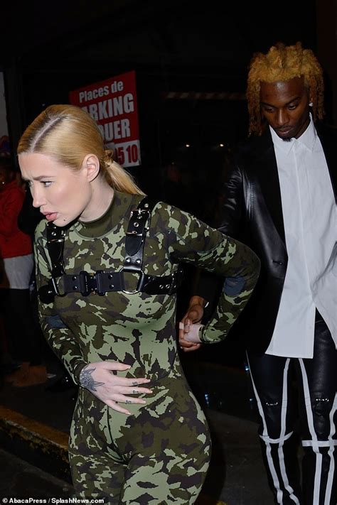 Iggy Azalea Shows Off Her Posterior In Skintight Denim As She Arrives