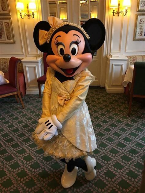 Lovely Minnie Mouse Striking A Sweet Pose In Her Beautiful Outfit