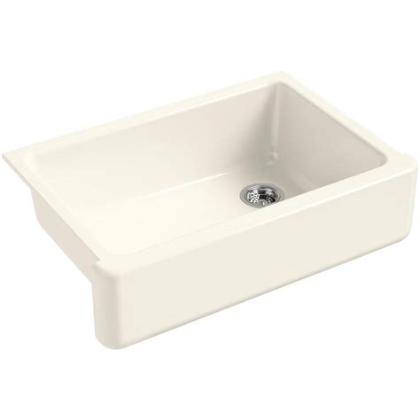 Accents with shine, such as the chrome cabinet pulls. KOHLER Whitehaven Farmhouse Apron-Front Cast-Iron 33 in ...