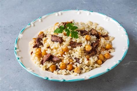 Premium Photo Rice Pilaf With Meat And Chickpeas Delicious Dishes