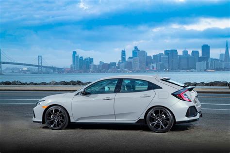 Drive away in the ultimate honda small car! 2017 Honda Civic Hatchback Sport Touring rear side ...