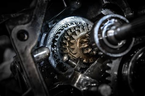 Car Transmission Gearbox With Visible Gears And Cogs In The Garage