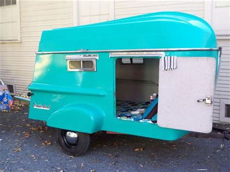 These Stylish Retro Campers Have Detachable Row Boats That Double As Roofs