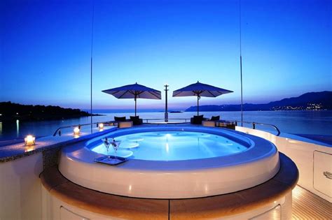 Hot tub is a a large, usually wooden, container full of hot water in which more than one person can sit. How to Choose the Outdoor Jacuzzi - TheyDesign.net ...