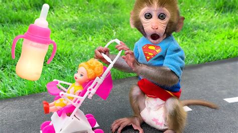 Monkey Baby Bon Bon Feeds Baby With A Bottle And Plays With Ducklings