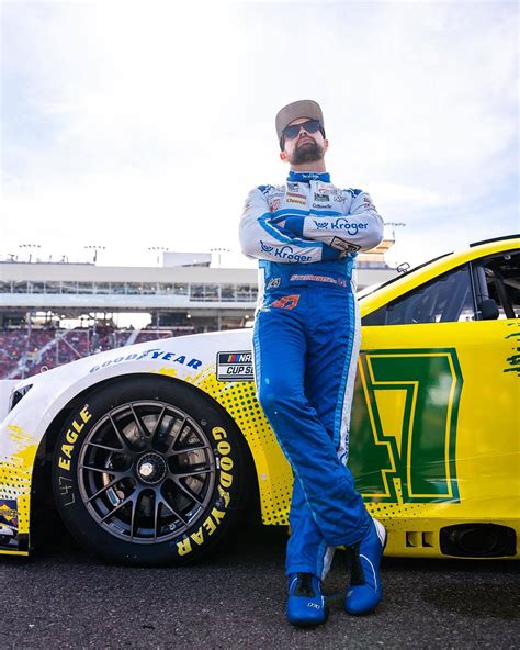 Download Ricky Stenhouse Jr. Leaning Against Car Wallpaper | Wallpapers.com