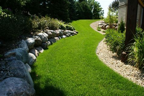 Edging Pavers And Berms Tamarack Landscaping Pavers Landscape