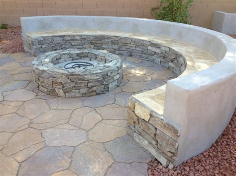 For additional comfort, add pillows or cushions. Fire pit and Bench seating using natural stone | Yelp