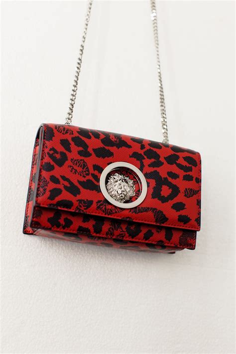 Unleash Your Inner Animalier With A Bold Versusversace Clutch Take A